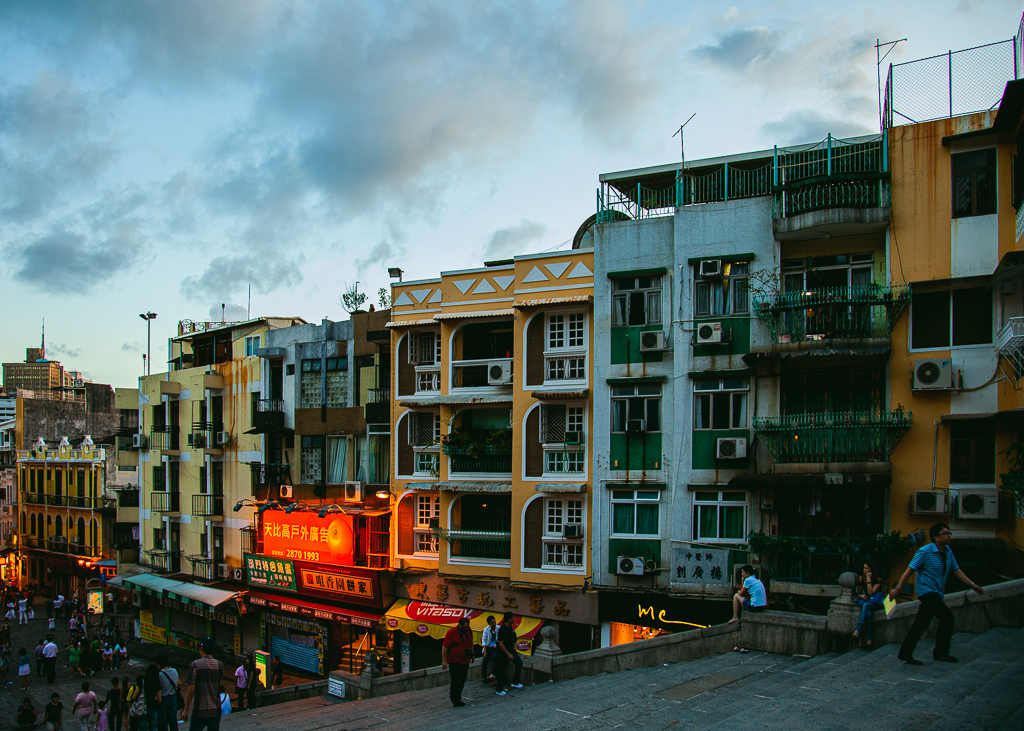 The colourful residential buildings along the staircase up to the St. Paul's Cathedral Ruins in Macau.